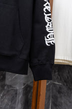 Black hoodie hem and sleeve cuff with ribbed trim