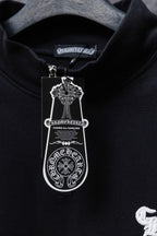 Black hoodie collar with brand tag and hanging size tag