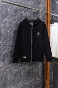 Black zip-up hoodie with front drawstring and small crest patch on chest