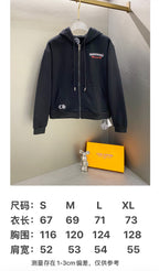 Dark zip-up hoodie with size chart showing length, chest, and sleeve measurements