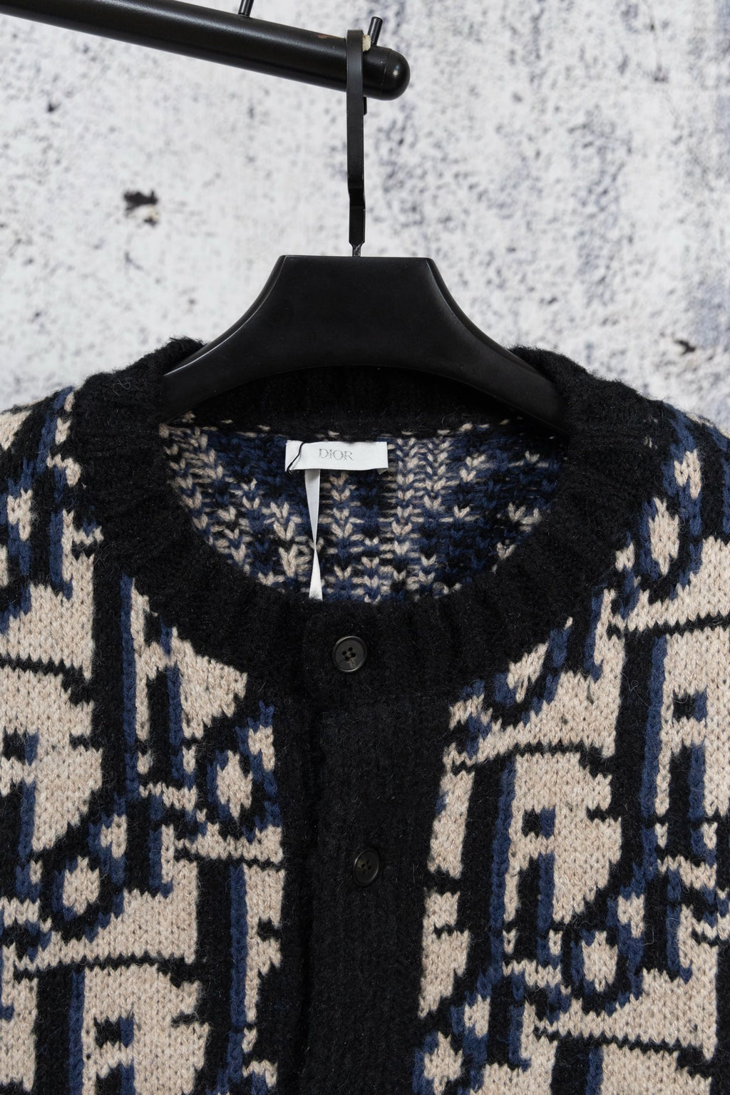 Knit cardigan collar and button placket, black with navy and cream geometric pattern