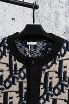 Knit cardigan collar and button placket, black with navy and cream geometric pattern