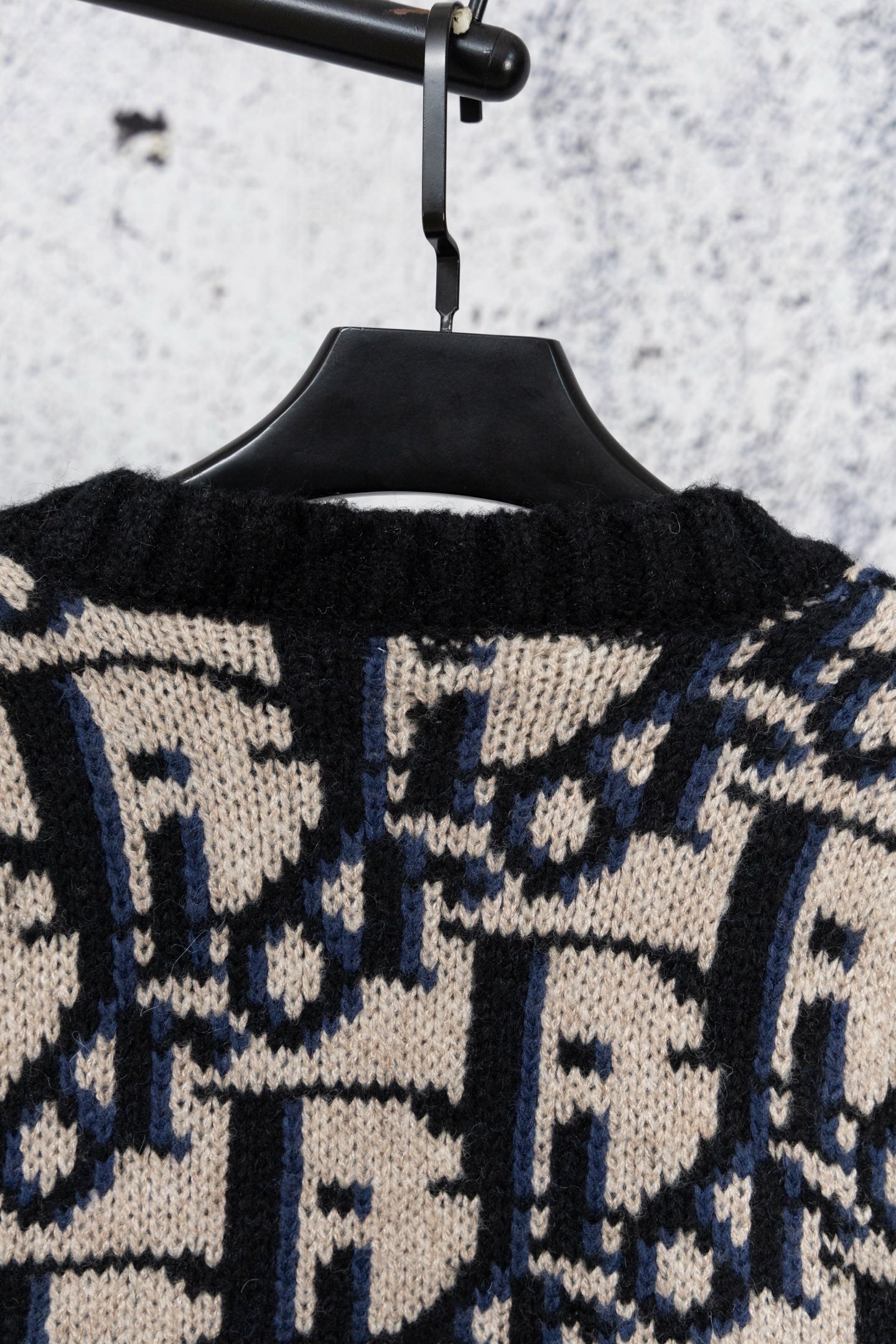 Knit cardigan back yoke and collar, black with navy and cream geometric jacquard