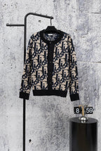 Dior knit cardigan with black base, navy and cream geometric jacquard, button front