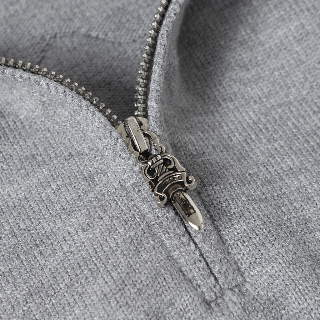 Light gray hoodie zipper with metal pull and contrast zipper tape