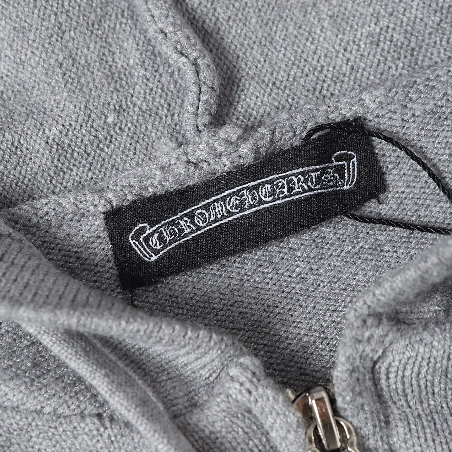 Hoodie inner neck label with drawstring cord and metal aglet