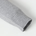 Heather gray ribbed cuff knit sleeve end