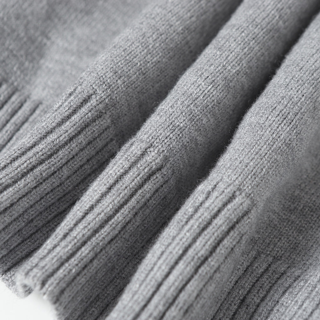 Heather gray knit hoodie fabric with ribbed sleeve cuffs