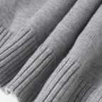 Heather gray knit hoodie fabric with ribbed sleeve cuffs