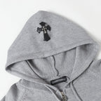 Light gray hoodie hood with black cross emblem and drawstring cords