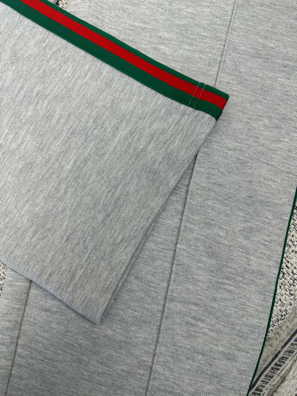 Gray Gucci pants with front pleat and red/green side stripe detail