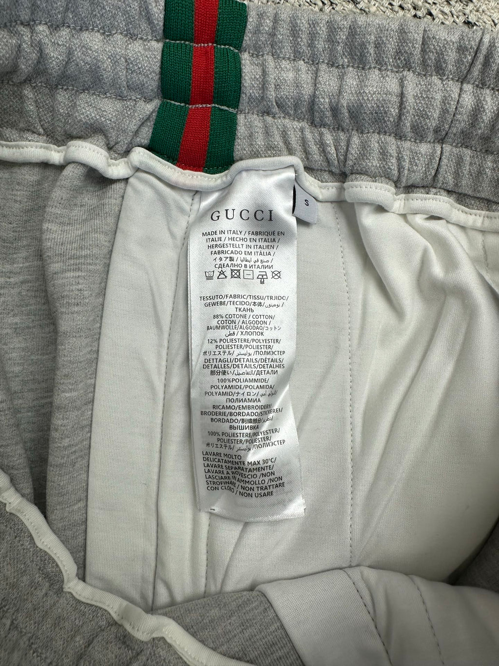 Gray Gucci pants with inner care label and elastic waistband