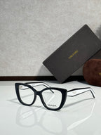 Prada eyeglasses, dark blue rectangular frames with clear lenses and Prada logo on bridge