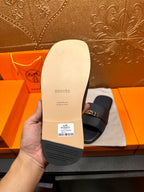 White sandal outsole with 'Hermes' printed and textured tread