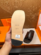 Off-white sandal sole with embossed HERMES and rubber tread grip