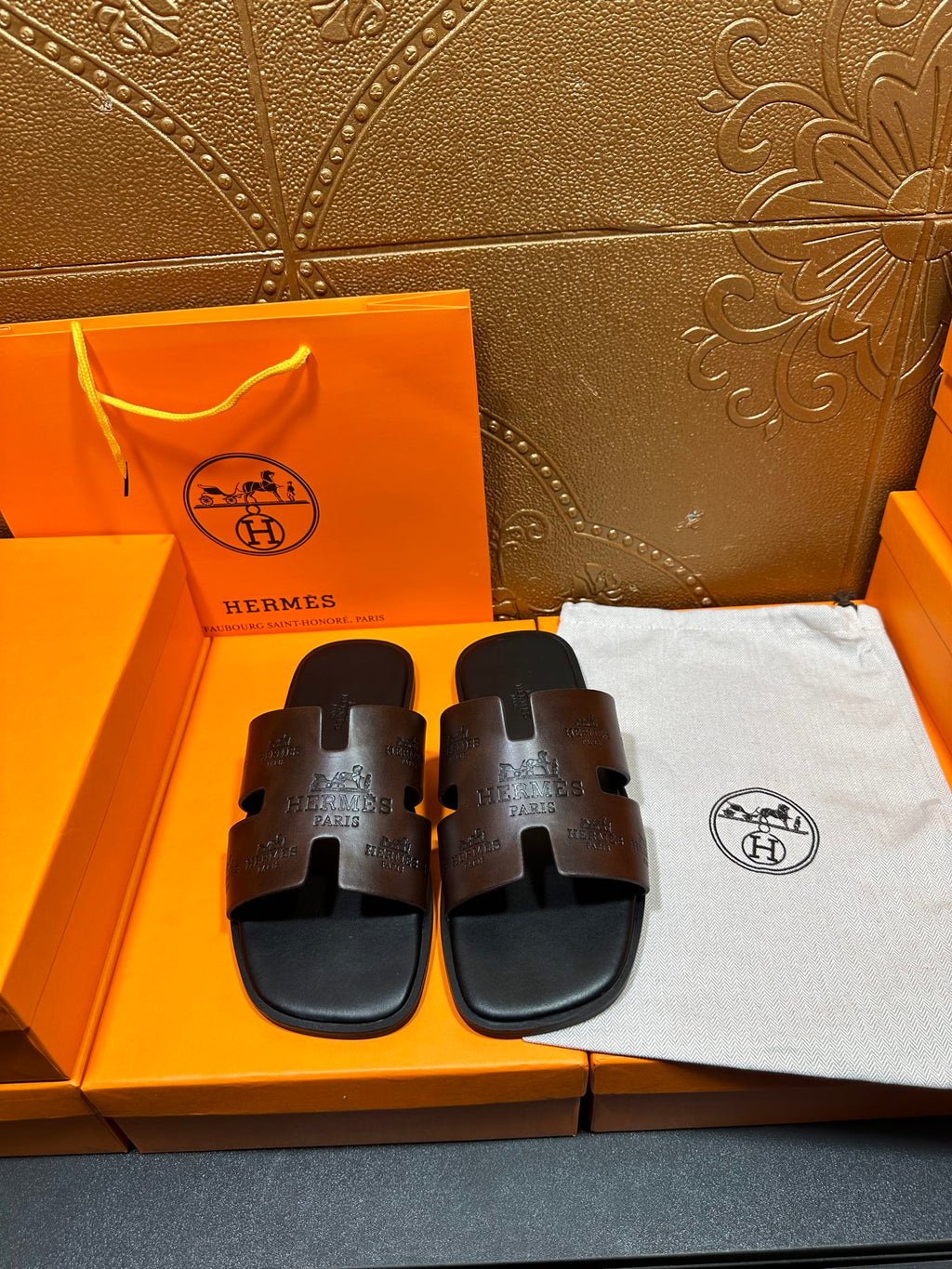 Hermes sandals, black slide sandals with molded footbed and embossed H logo