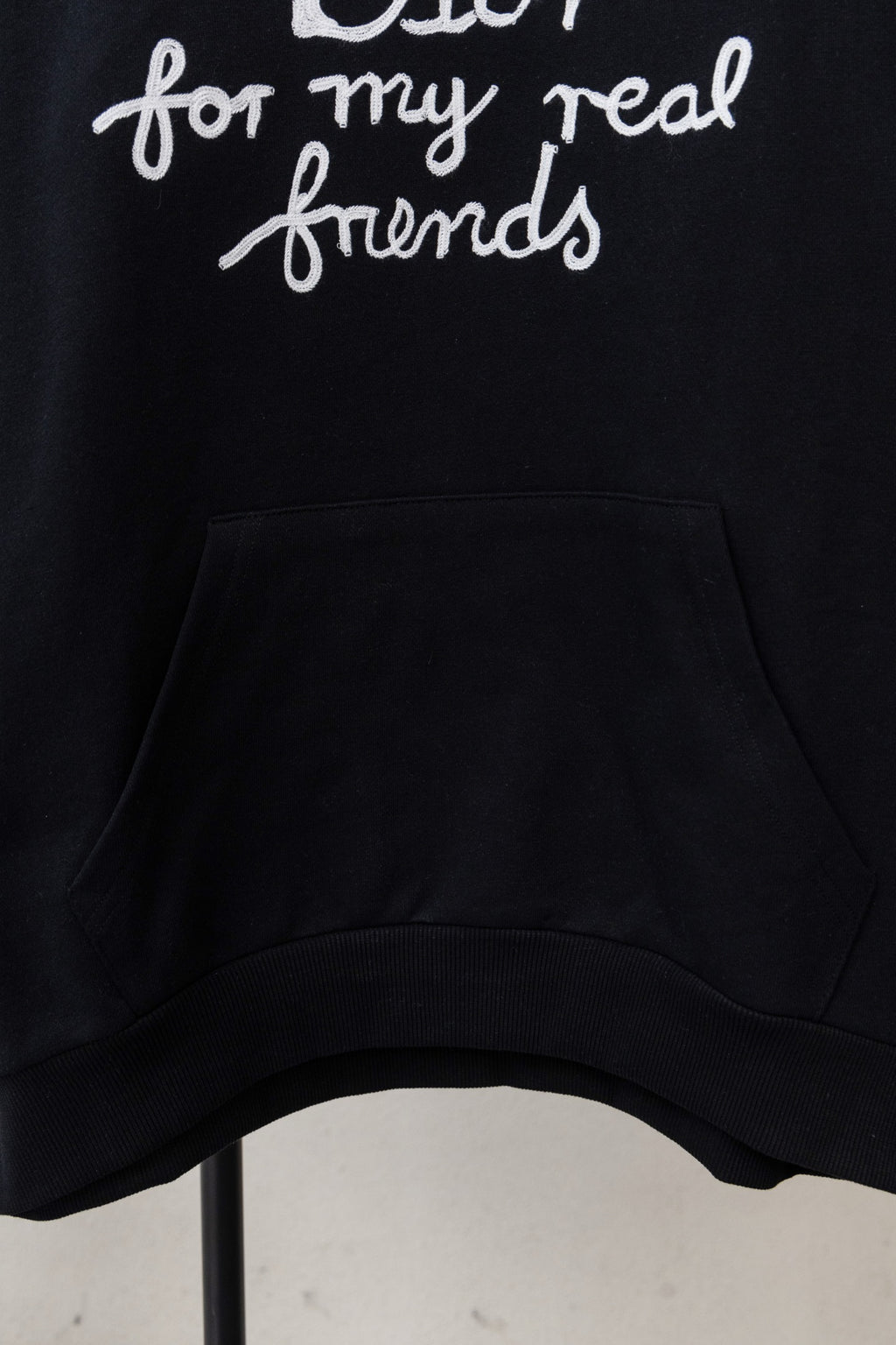 Dior black hoodie front pocket with 'Dior for my real friends' text above