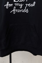 Dior black hoodie front pocket with 'Dior for my real friends' text above