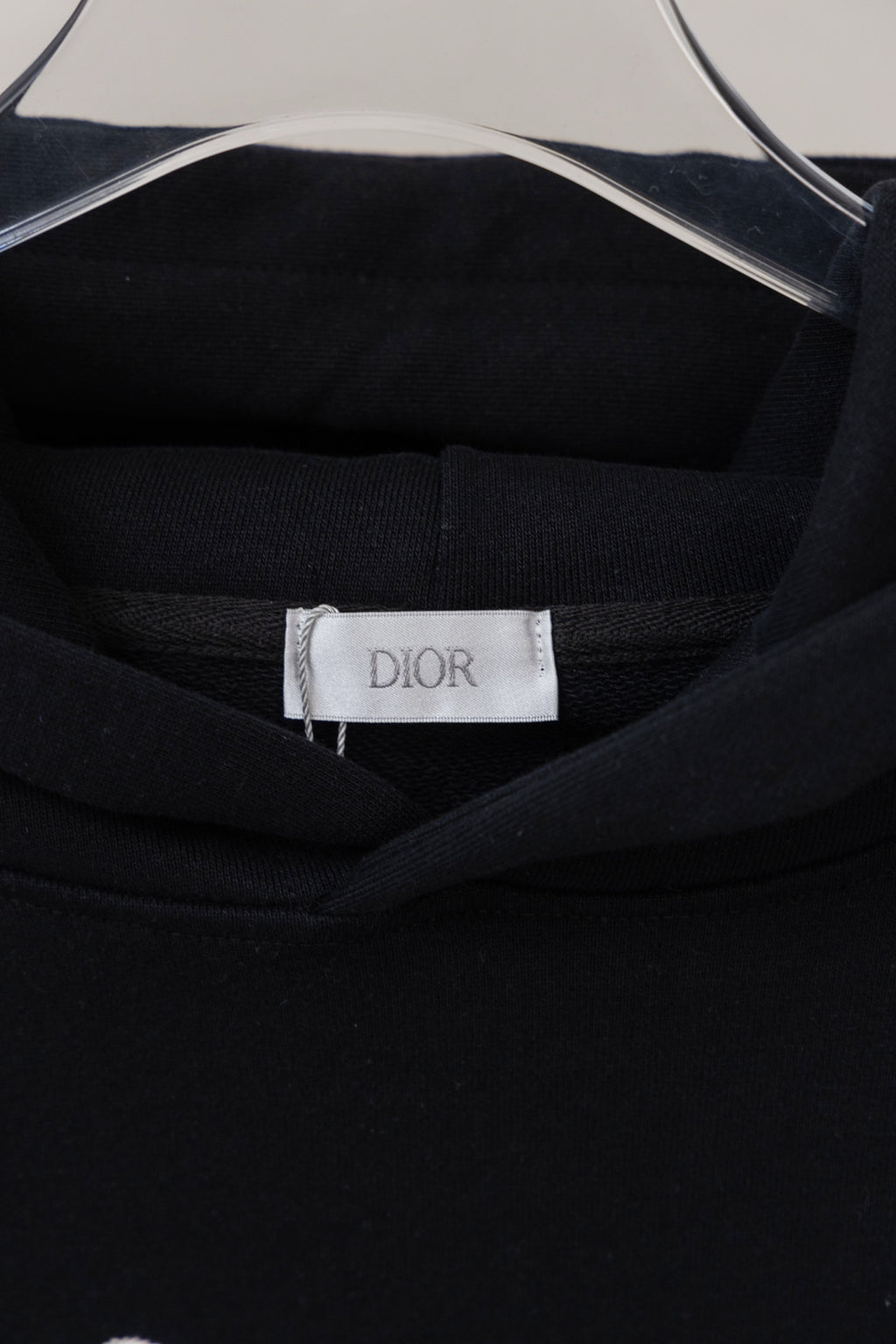 Dior black hoodie neckline with Dior label at the inside collar