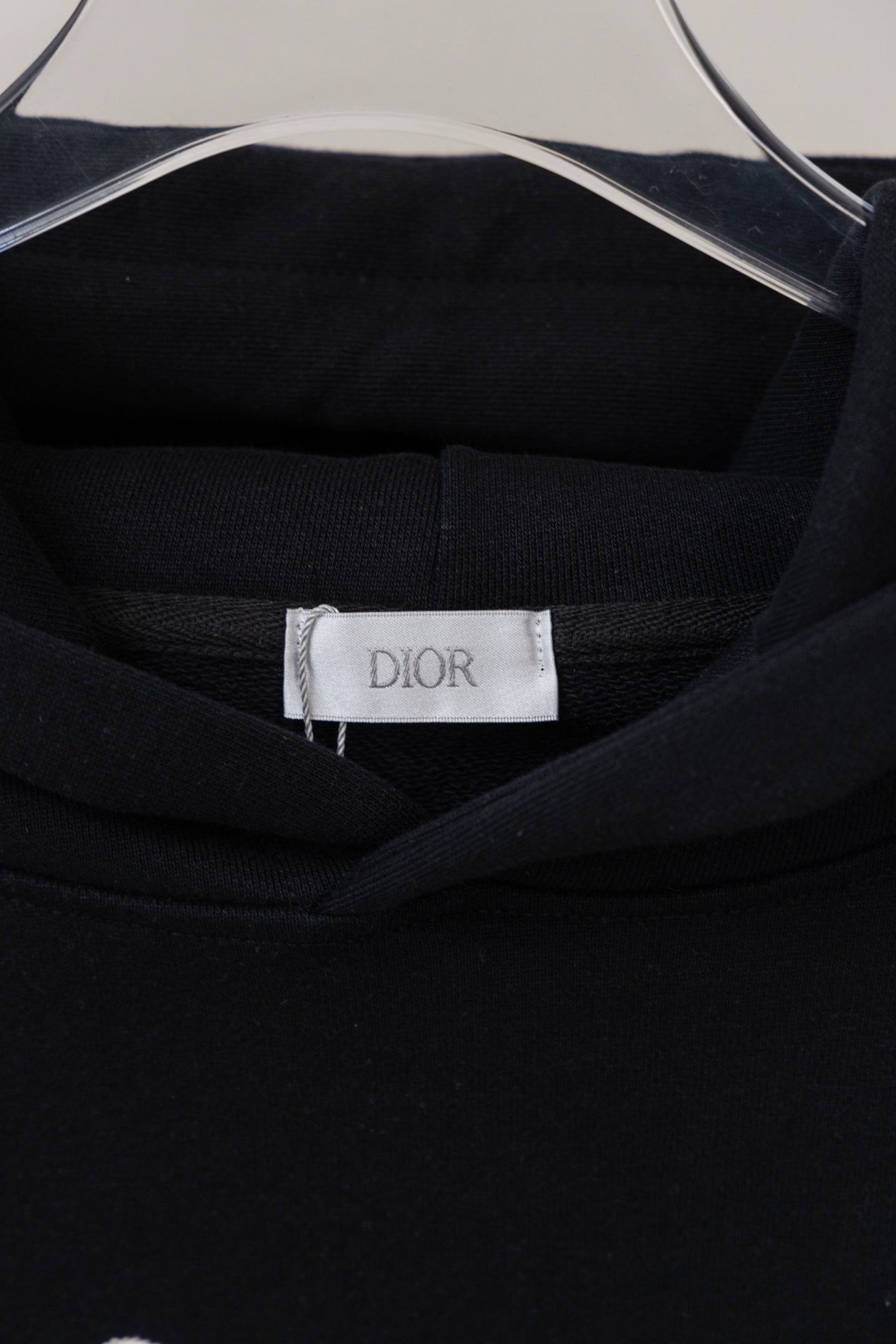 Dior black hoodie neckline with Dior label at the inside collar