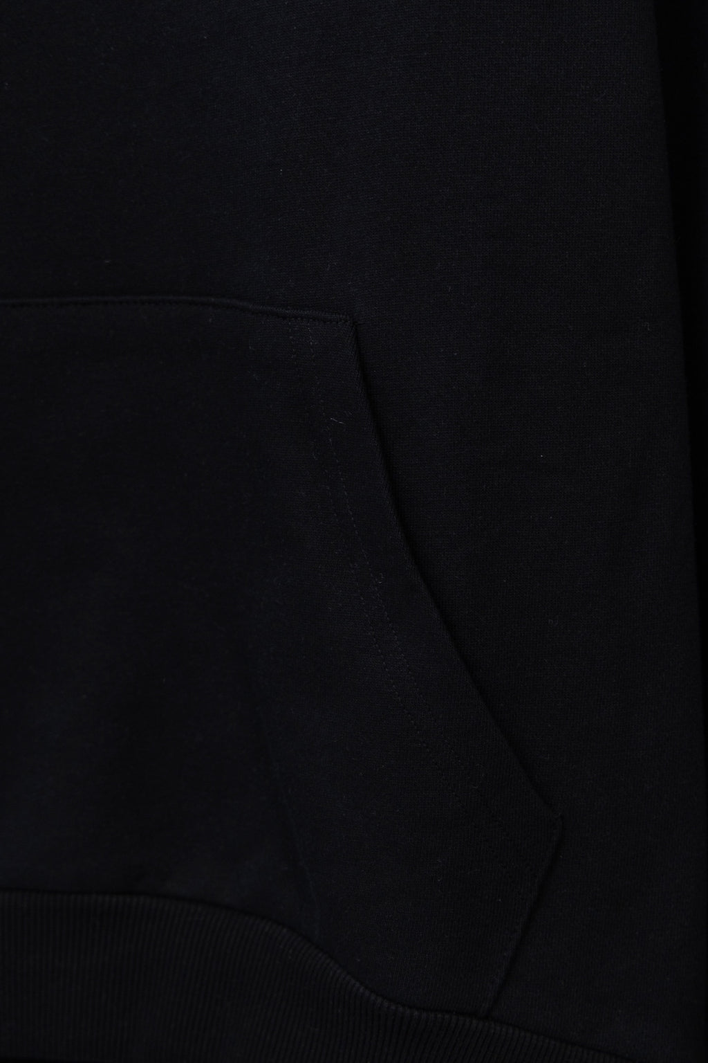 Dior black hoodie front pocket with ribbed hem and stitch seams