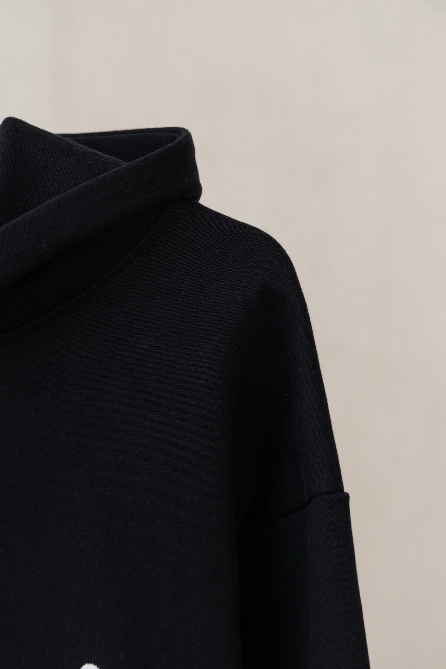 Dior black hoodie sleeve and shoulder with hood edge