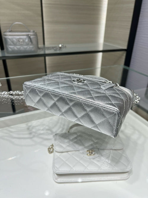 Chanel quilted mini bag in silver-tone with chain strap, top handle and zipper detail