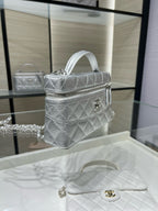 Chanel quilted mini shoulder bag in silver-tone with chain strap and logo clasp