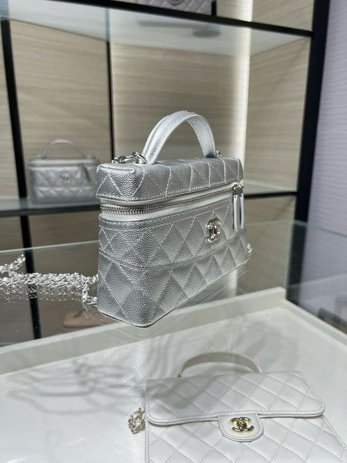Chanel quilted mini shoulder bag in silver-tone with chain strap and logo clasp