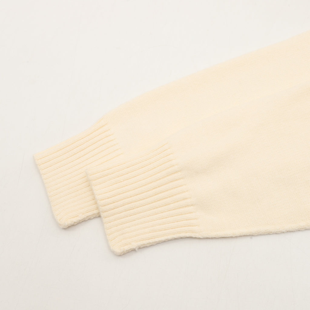 Amiri knit sweater bottom edge, cream ribbed cuff and knit hem