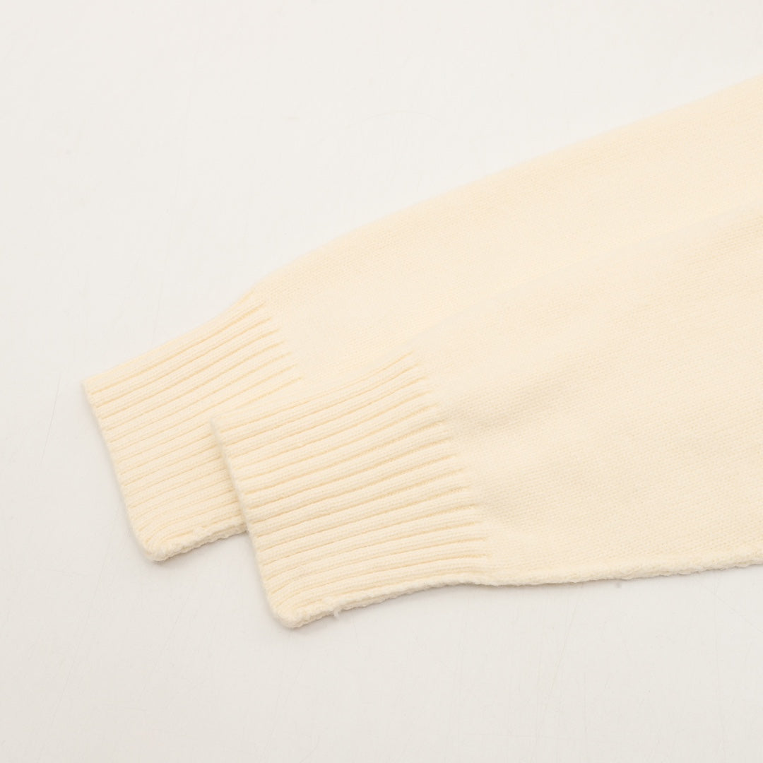 Amiri knit sweater bottom edge, cream ribbed cuff and knit hem