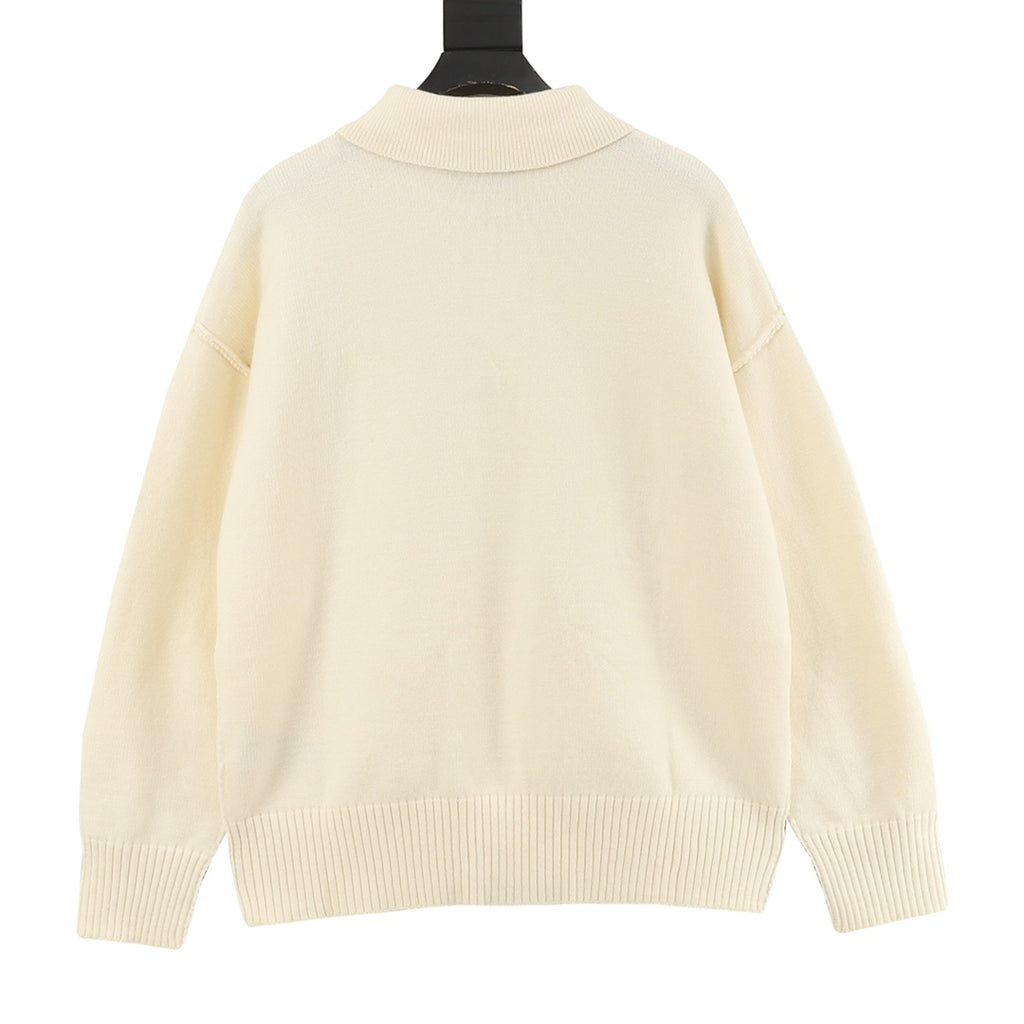 Amiri knit sweater, cream back view with ribbed hem and cuffs