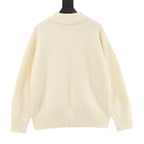 Amiri knit sweater, cream back view with ribbed hem and cuffs