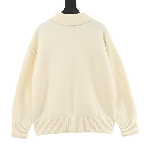 Amiri knit sweater, cream back view with ribbed hem and cuffs