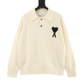 Amiri knit sweater, cream polo collar with black heart and 'X' graphic
