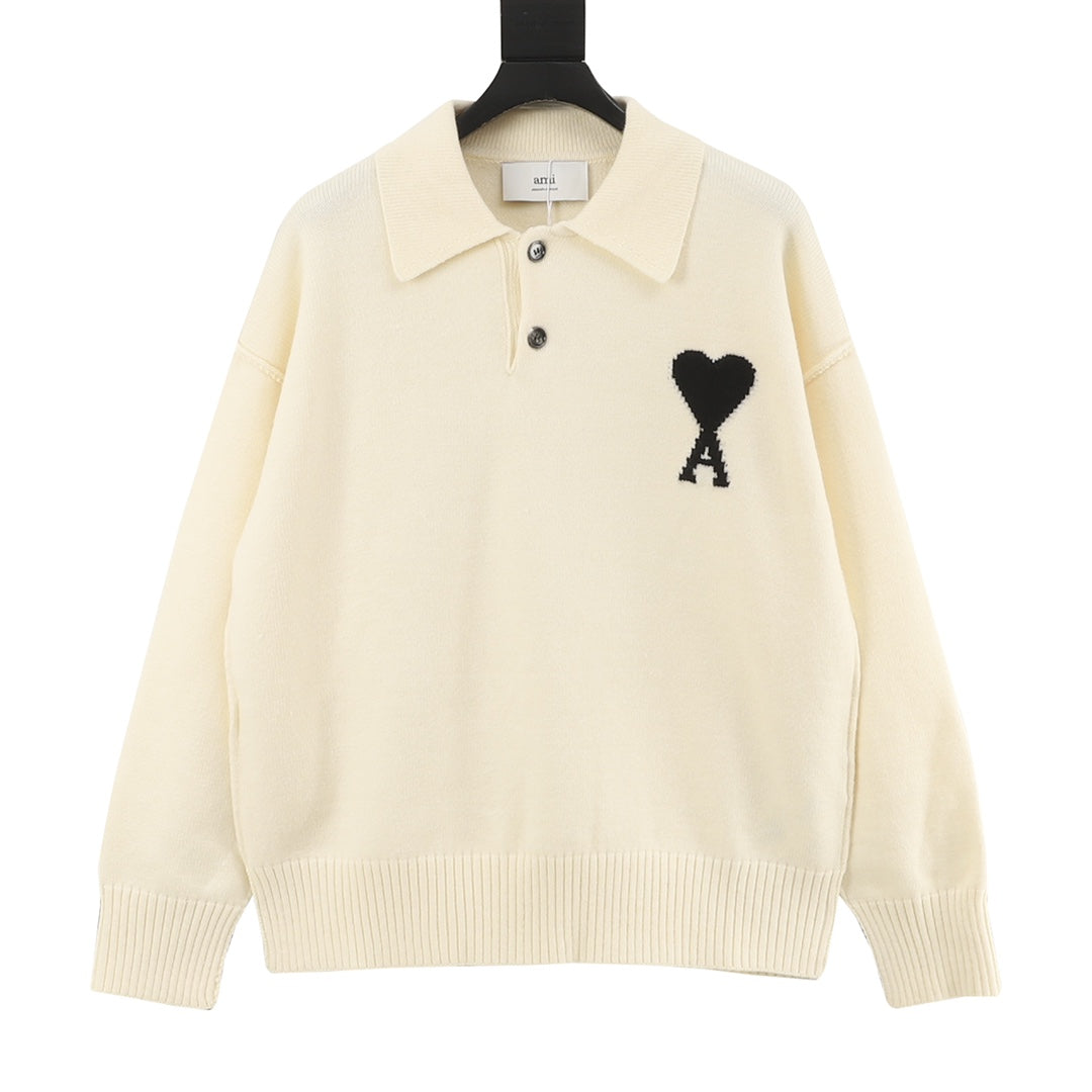 Amiri knit sweater, cream polo collar with black heart and 'X' graphic