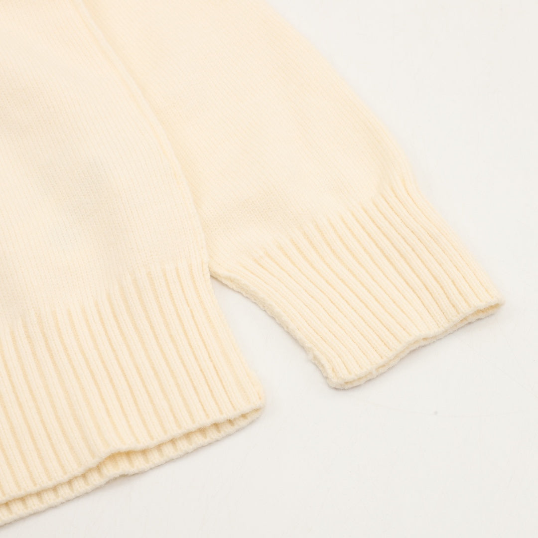 Amiri knit sweater sleeve cuff, cream ribbed knit with stitched seam