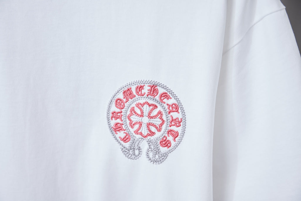 White T-shirt chest logo in red and gray embroidery