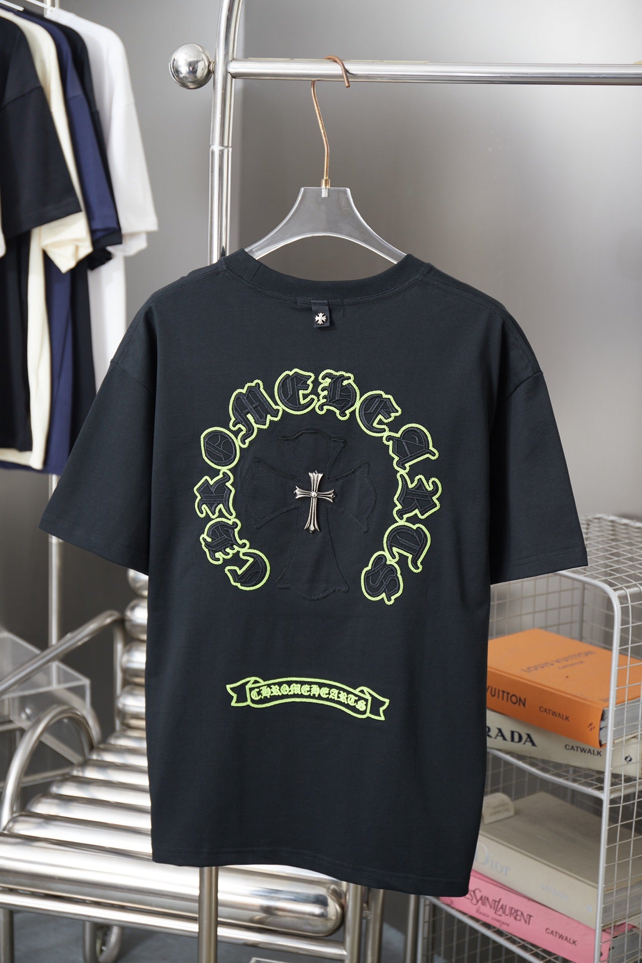 Dark short-sleeve T-shirt with neon green back circular graphic and text