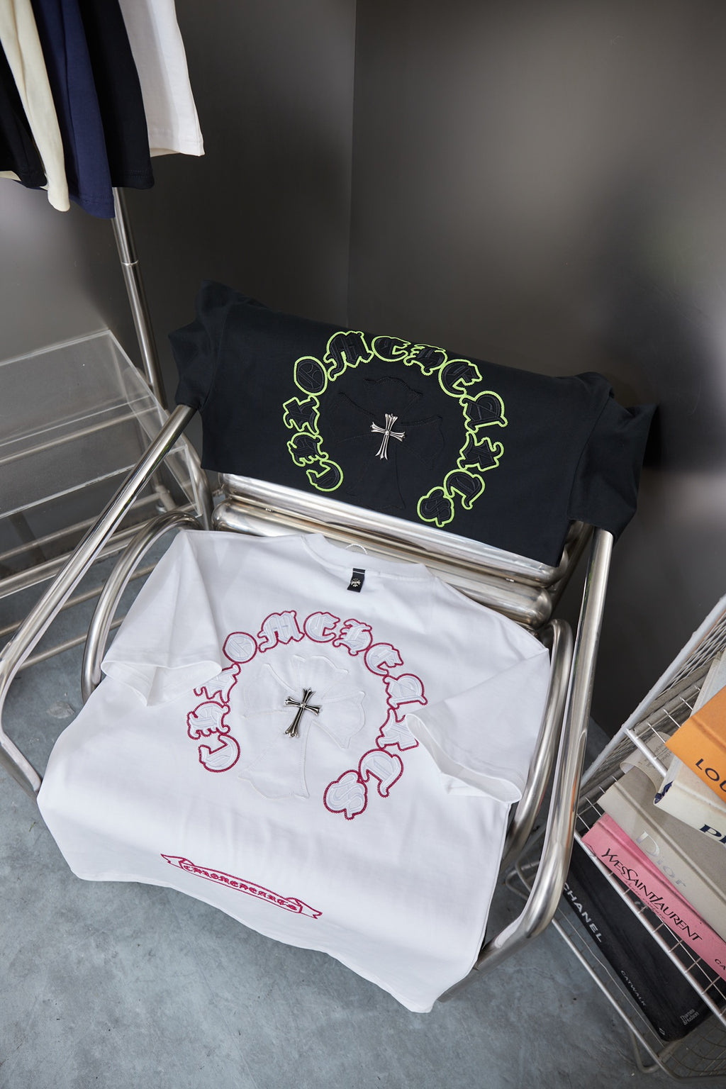 Set of two T-shirts: white and black, each with ring and cross graphic