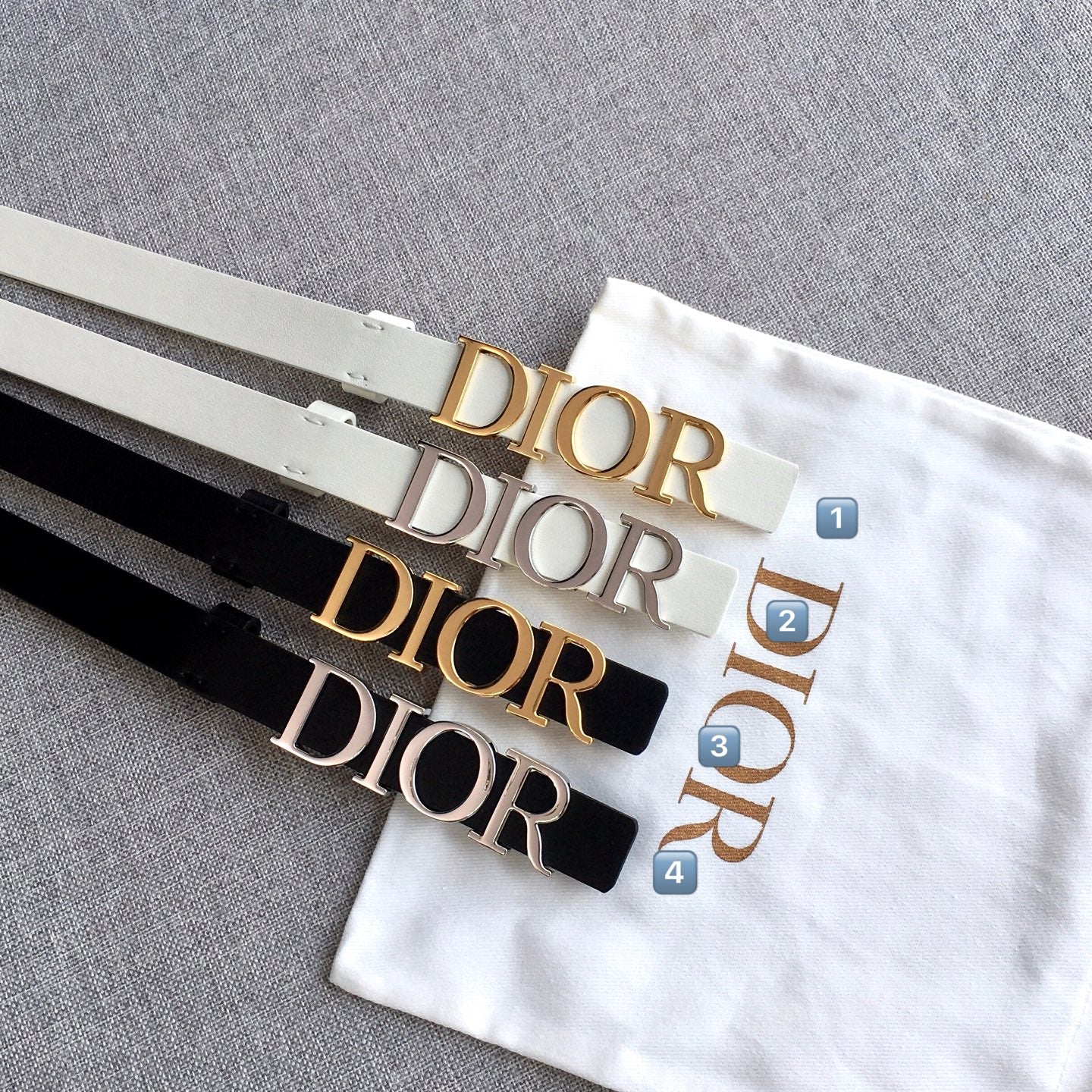 Dior belt with adjustable hole positions on light ivory strap and silver-tone buckle