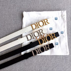 Set of Dior belts with logo buckles: white strap, black strap, dark strap