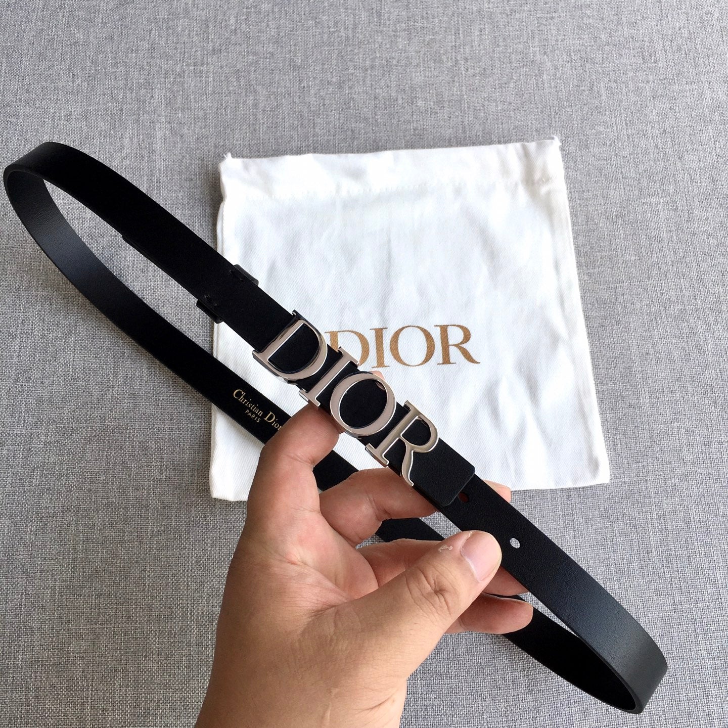 Dior belt with black strap and silver-tone buckle, Dior logo centered