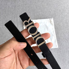 Dior belt front with black strap, silver buckle and visible adjustment holes