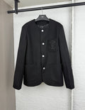 Black Louis Vuitton long jacket with button front and chest LV emblem