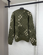 Green knit sweater with monogram pattern, crew neck, long sleeves