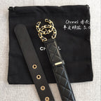 Chanel black quilted belt with gold chain charm, adjustable strap and snap holes