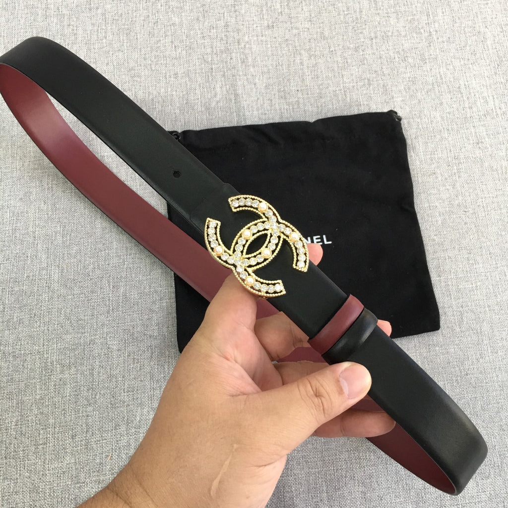 Chanel belt in black with burgundy strap and gold jeweled CC logo buckle
