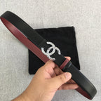 Black leather-look Chanel belt with burgundy strap and silver double-C buckle