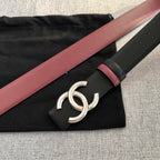 Chanel belt shown flat: black strap with burgundy edge and silver double-C buckle